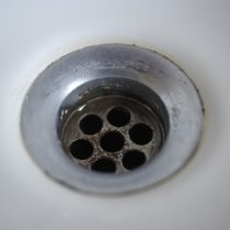 Stainless sink hole