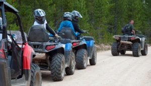 Men riding on their ATV's
